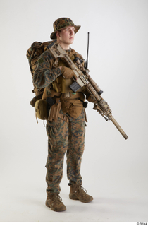 Photos Casey Schneider Paratrooper with gun holding gun standing whole…